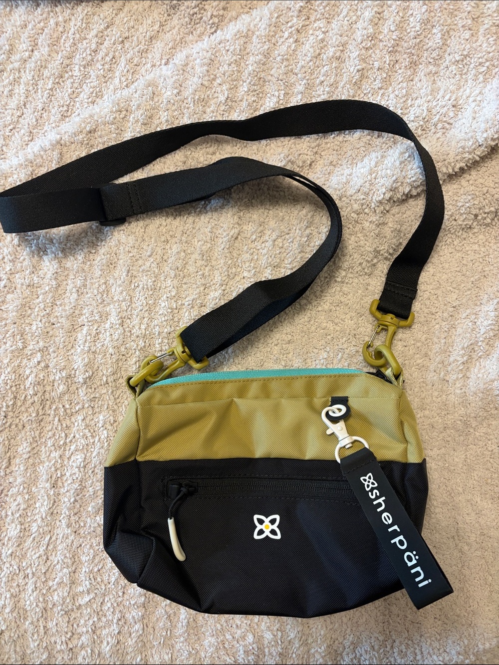 Sherpani Olive & Black Crossbody Belt Bag with Aqua Accent